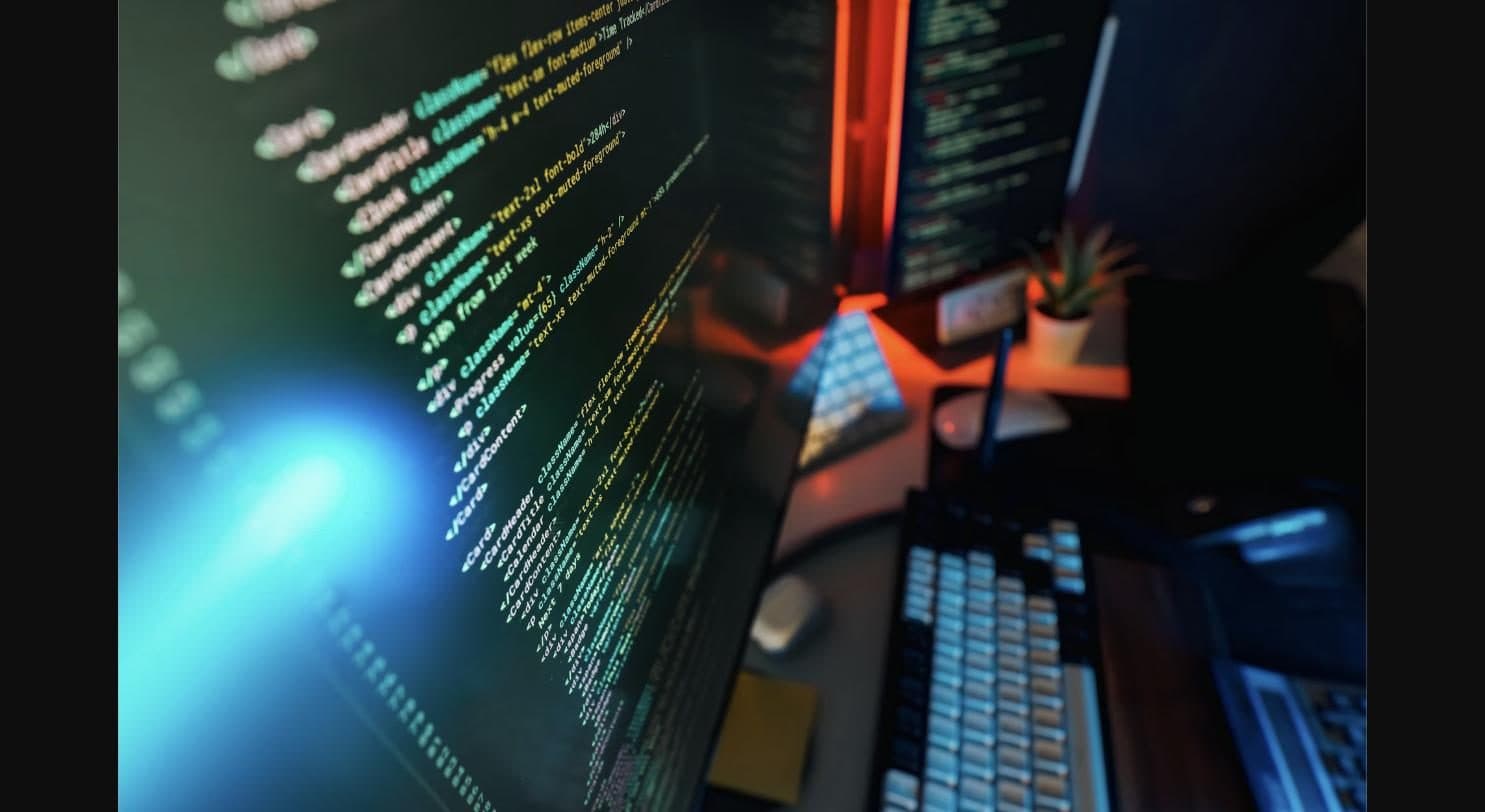 Code on screen at a developer's desk